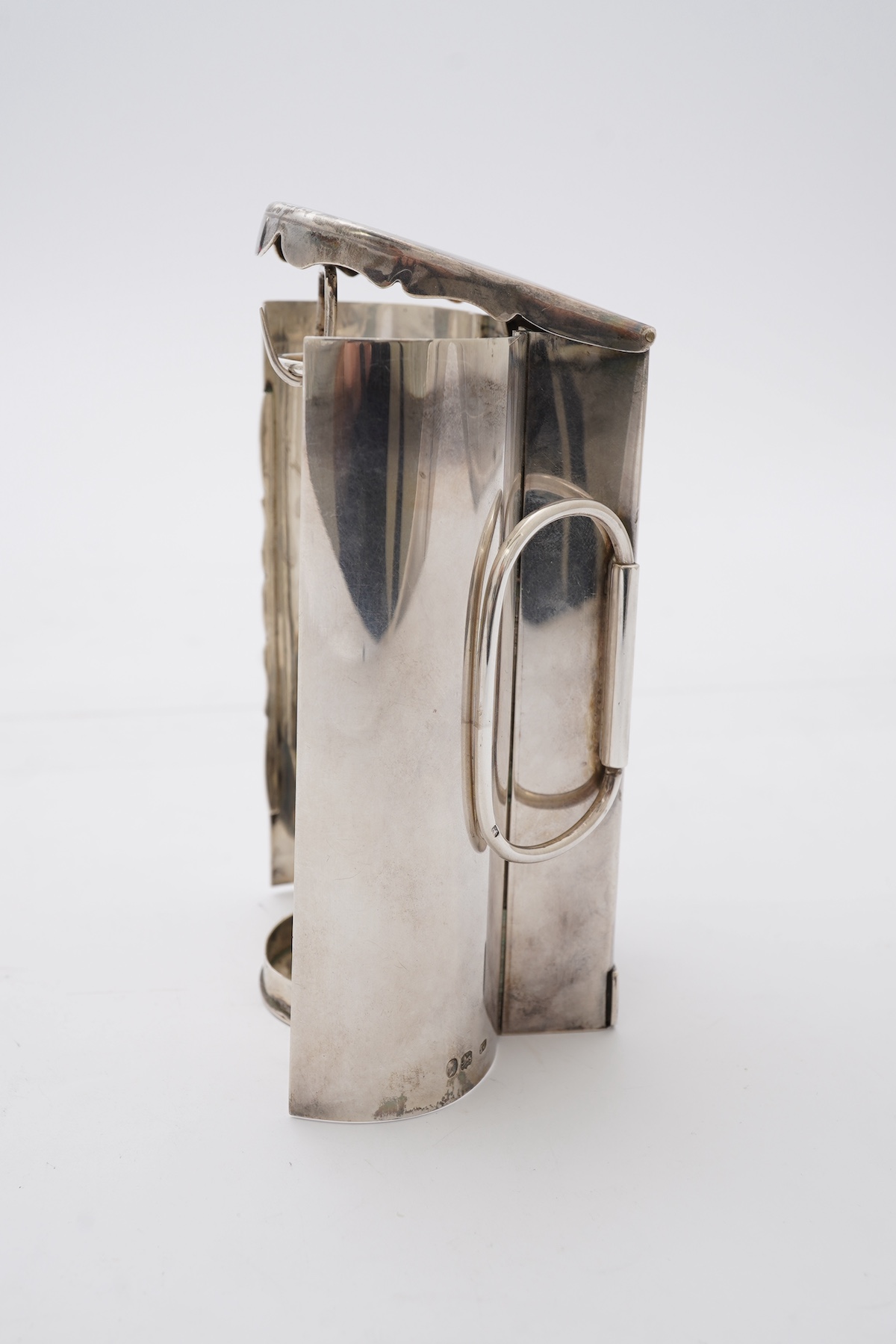A Victorian silver travelling coach lamp by Thomas Johnson I, in original fitted leather case, retailed by Leuchers, 38 Piccadilly, London